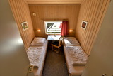 Ferienhaus in Pelzerhaken - Ferienhaus Typ B im Ferienpark AM WALDRAND - Schlafzimmer mit Einzelbetten